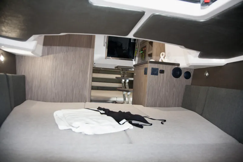 Slide: The Image of Interior cabin of 2025 Ranieri CAYMAN 35.0 EXECUTIVE with modern design and comfortable bedding. - 16