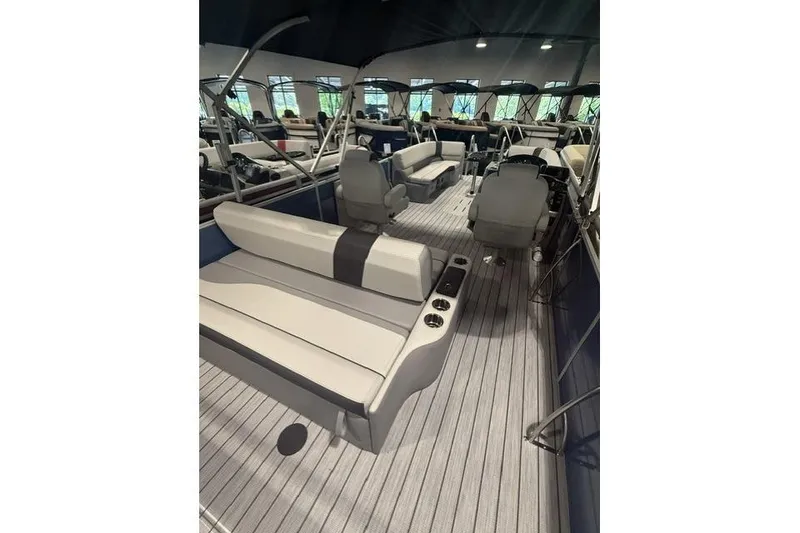 Slide: The Image of 2026 SunCatcher Select 322SL pontoon boat interior with spacious seating and modern design. - 10
