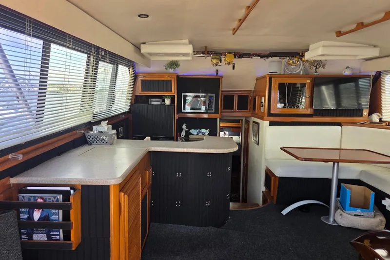 Slide: The Image of Interior of 1990 Egg Harbor Golden Egg 42 yacht with modern kitchen and seating area. - 13