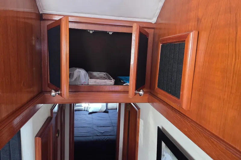 Slide: The Image of Wooden interior cabinets on a 1990 Egg Harbor Golden Egg 42 boat. - 19
