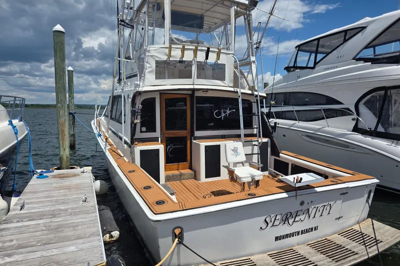 Slide: The Image of 1990 Egg Harbor Golden Egg 42 yacht docked at Monmouth Beach, NJ marina. - 2