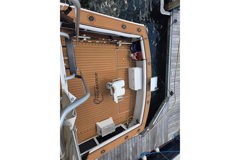 Slide: The Image of Deck view of 1990 Egg Harbor Golden Egg 42 boat docked at marina. - 5