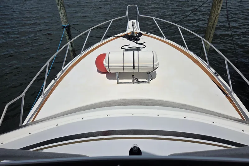 Slide: The Image of Bow view of 1990 Egg Harbor Golden Egg 42 yacht with life raft on deck. - 7