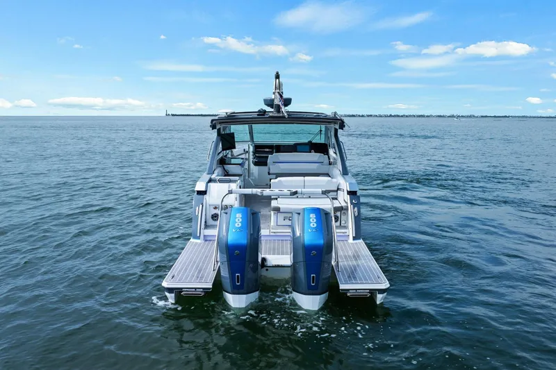 Slide: The Image of 2023 Formula 380 Super Sport Crossover OB on open water, rear view. - 4