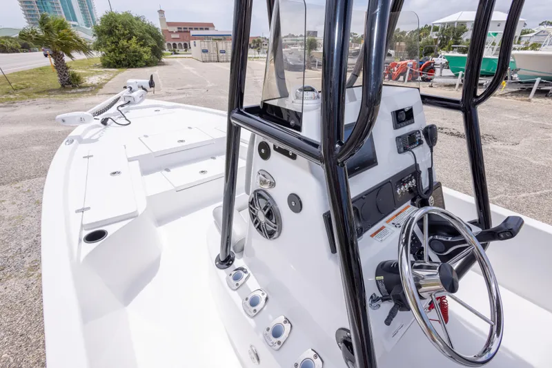 Slide: The Image of 2023 Blazer Bay 2200 boat interior with steering console and controls. - 31