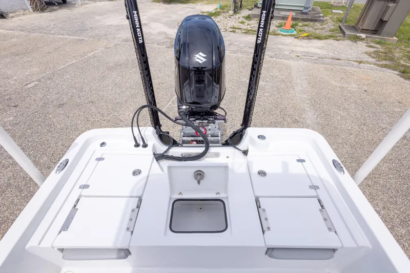 Slide: The Image of 2023 Blazer Bay 2200 boat with Minn Kota motor, rear deck view. - 42