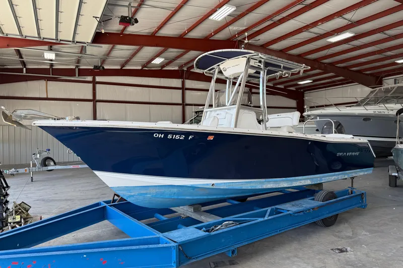 Slide: The Image of 2015 Sea Hunt Ultra 234 boat on trailer in indoor storage facility. - 3