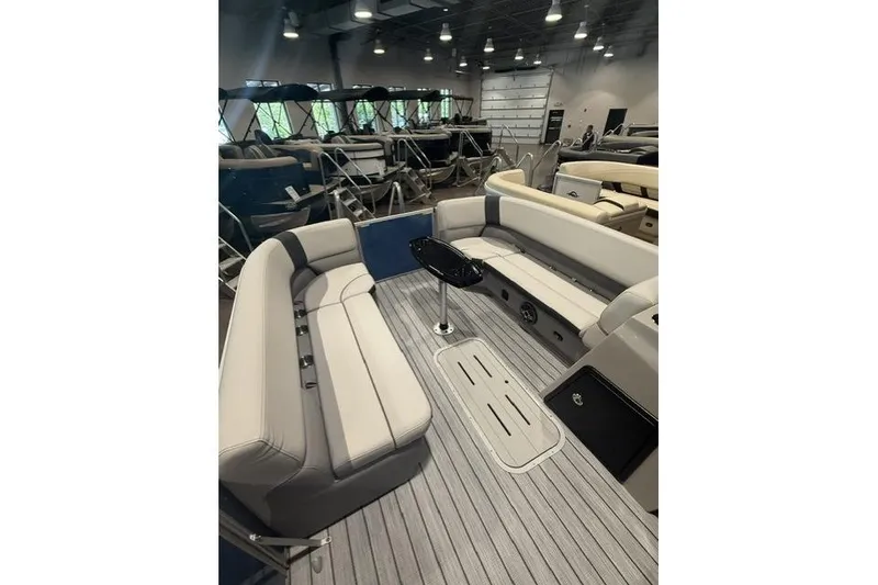 Slide: The Image of 2026 SunCatcher Select 322SL pontoon boat interior with spacious seating and modern design. - 9