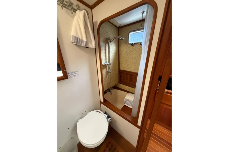 Slide: The Image of Compact bathroom in 1988 Monk 36 boat with shower and toilet. - 19