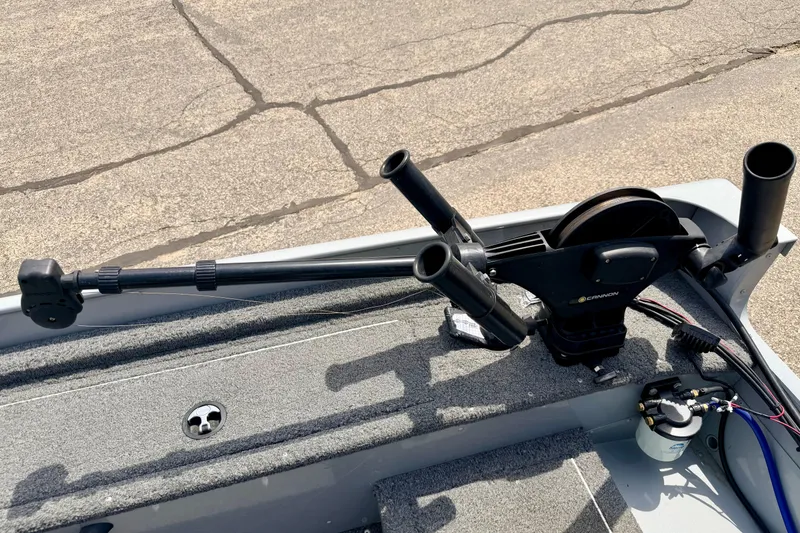 Slide: The Image of Fishing rod holders on a 2003 Lund 1675 Adventure SS boat deck. - 23
