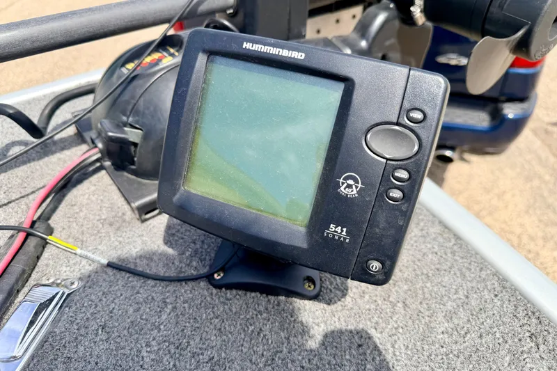 Slide: The Image of Humminbird sonar device on 2003 Lund 1675 Adventure SS boat dashboard. - 62
