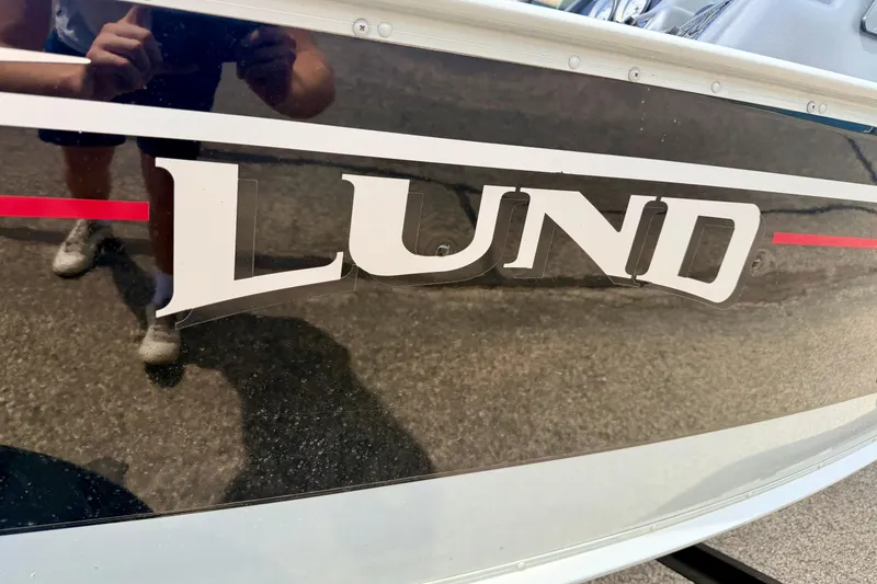 Slide: The Image of Close-up of 2003 Lund 1675 Adventure SS boat logo on hull. - 9