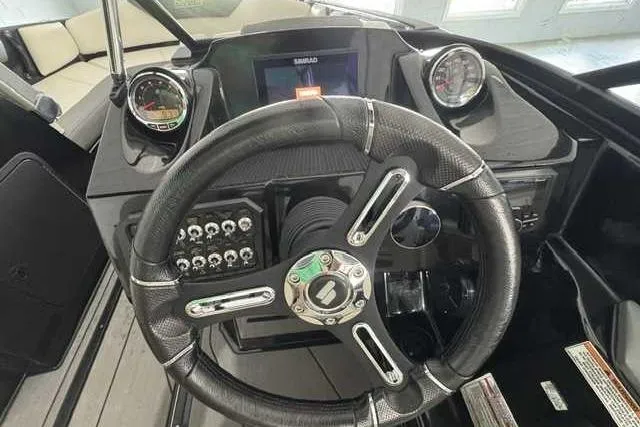 Slide: The Image of Steering wheel and dashboard of 2020 Heyday WT-2DC boat with gauges and controls. - 4
