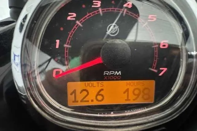 Slide: The Image of Close-up of Heyday WT-2DC 2020 tachometer showing 12.6 volts and 198 hours. - 5