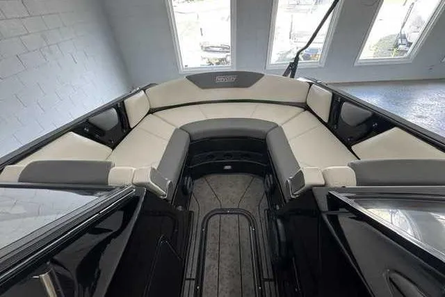 Slide: The Image of 2020 Heyday WT-2DC boat interior with cushioned seating and sleek design. - 6