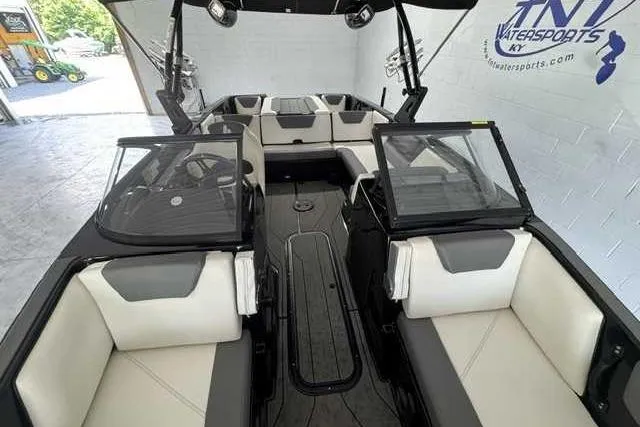 Slide: The Image of 2020 Heyday WT-2DC boat interior with dual consoles and cushioned seating. - 7