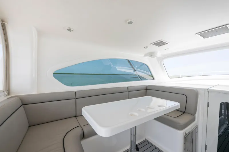 Slide: The Image of Interior of 2008 Ocean Yacht 37 Billfish with sleek seating and table. - 15