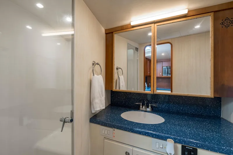 Slide: The Image of Luxurious bathroom in 2008 Ocean Yacht 37 Billfish, featuring sleek design and modern amenities. - 23