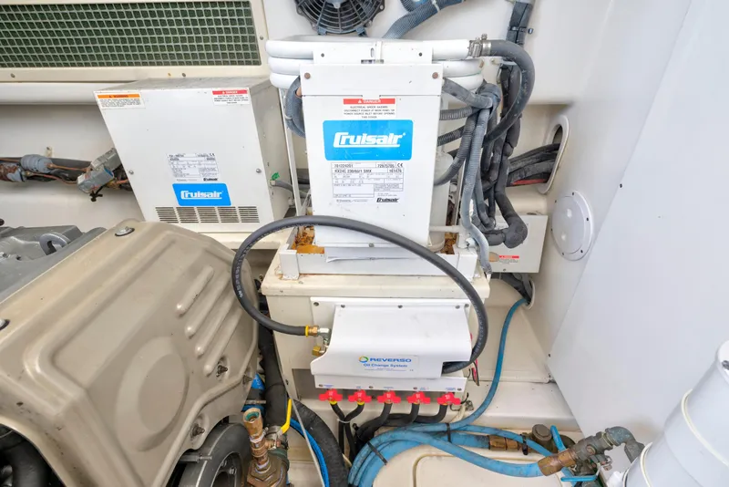 Slide: The Image of Engine room of 2008 Ocean Yacht 37 Billfish with Cruisair systems and wiring. - 31