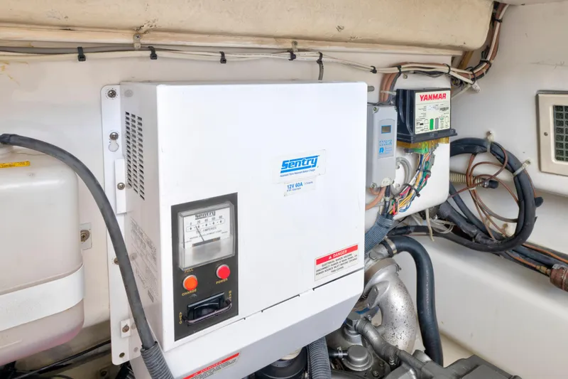 Slide: The Image of Engine room of 2008 Ocean Yacht 37 Billfish with Sentry battery charger and Yanmar components. - 32