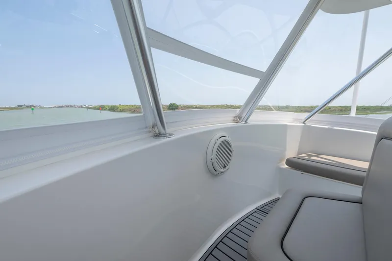 Slide: The Image of Interior view of 2008 Ocean Yacht 37 Billfish with cushioned seating and panoramic windows. - 5