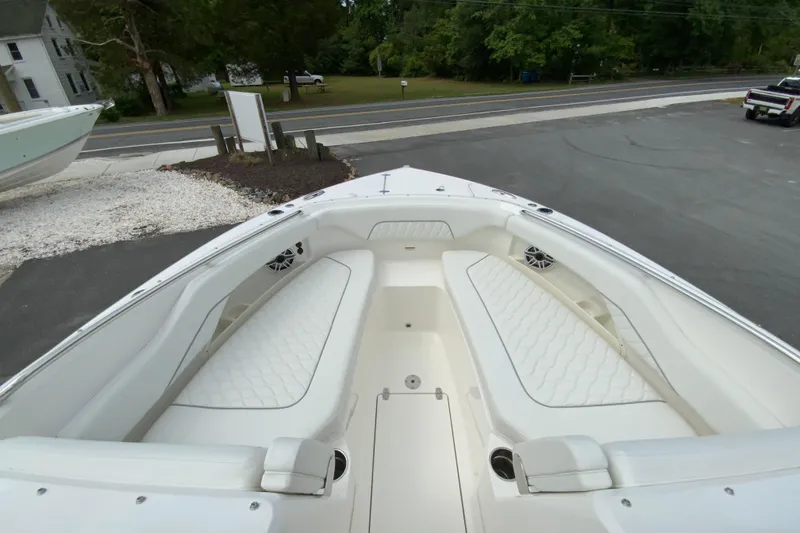 Slide: The Image of 2026 Pursuit DC 286 Dual Console boat with spacious seating and sleek design. - 30