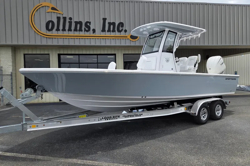 The Image of 2026 Sportsman Masters 247 Bay Boat on trailer outside Collins Inc. showroom. - 0
