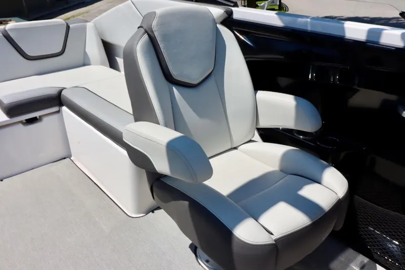 Slide: The Image of 2023 Yamaha Boats AR250 interior with sleek, modern seating design. - 14
