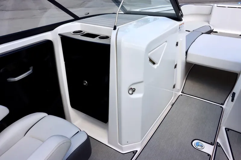 Slide: The Image of 2023 Yamaha Boats AR250 interior with sleek seating and modern design features. - 15