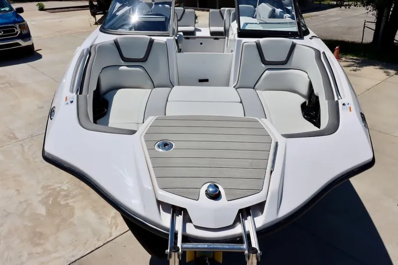 Slide: The Image of 2023 Yamaha Boats AR250 bow view with seating and deck details. - 22