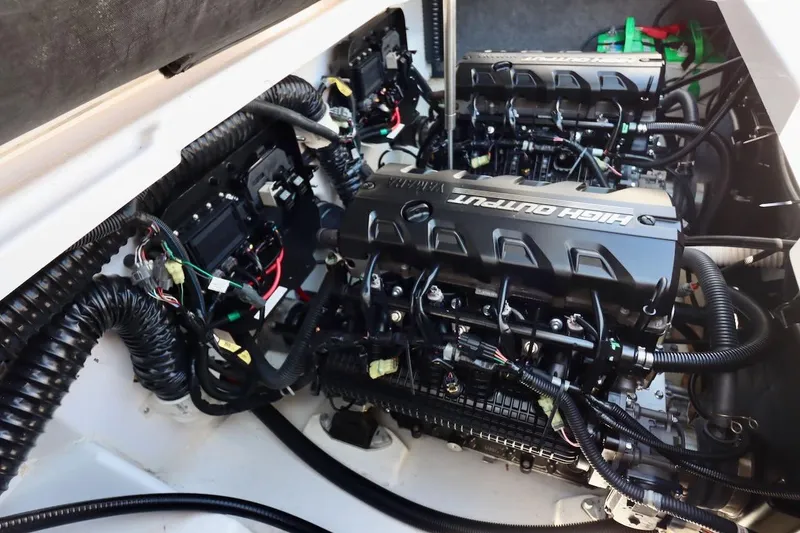 Slide: The Image of 2023 Yamaha AR250 boat engine compartment with dual high-output engines. - 41