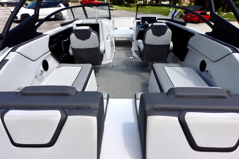 Slide: The Image of 2023 Yamaha Boats AR250 interior with modern seating and sleek design. - 6