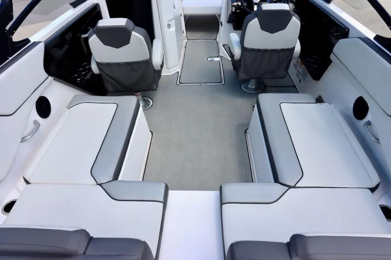 Slide: The Image of 2023 Yamaha Boats AR250 interior with sleek seating and modern design. - 7
