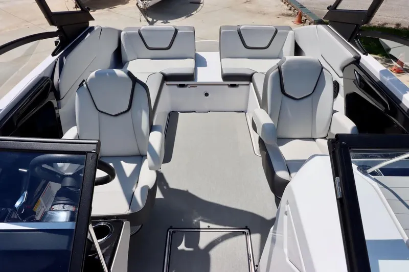 Slide: The Image of 2023 Yamaha Boats AR250 interior with modern seating and sleek design. - 8