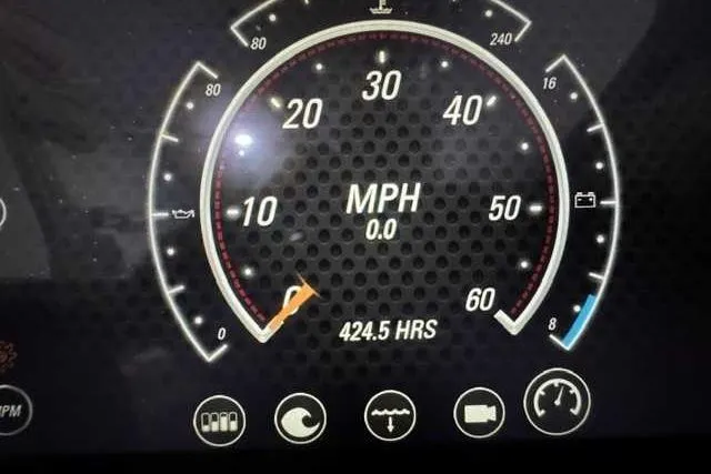 Slide: The Image of Dashboard of 2023 Malibu Wakesetter 25 LSV showing 0 MPH and 424.5 hours. - 5