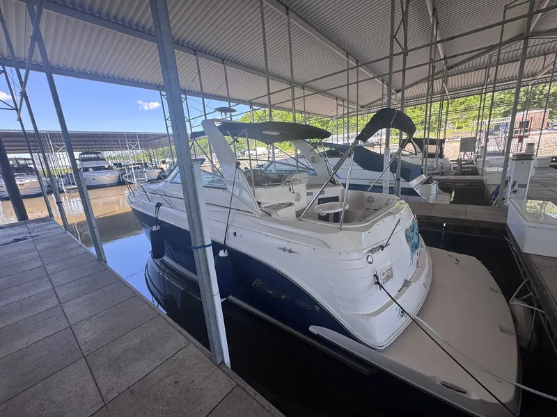Slide: The Image of 2006 Rinker Fiesta Vee 300 boat in covered marina. - 11