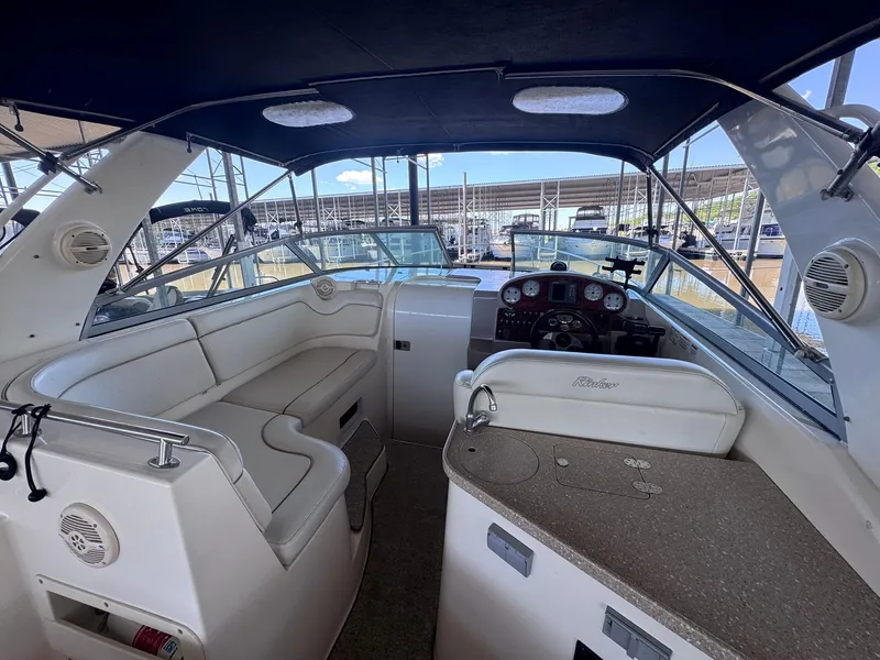 Slide: The Image of Interior of a 2006 Rinker Fiesta Vee 300 yacht with helm station. - 16