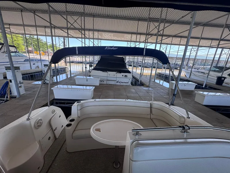 Slide: The Image of 2006 Rinker Fiesta Vee 300 in a covered boat dock. - 17