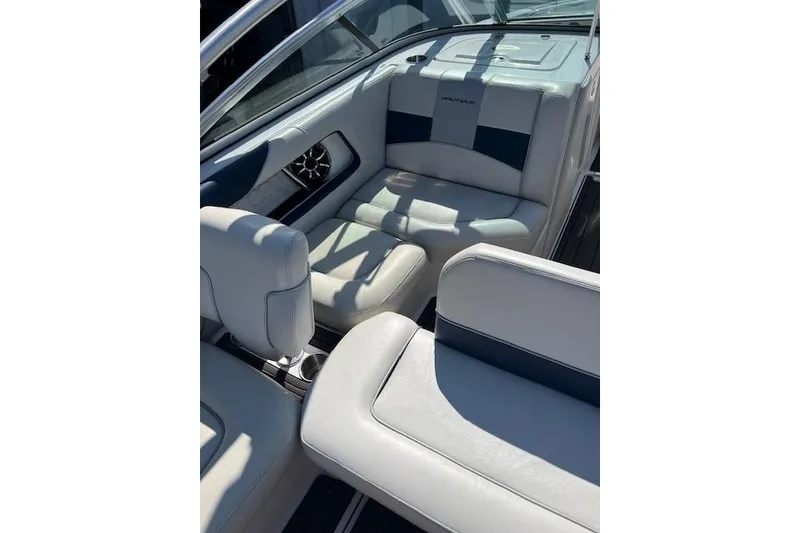 Slide: The Image of 2008 Nautique Super Air Nautique 230 interior with white and blue seating. - 3