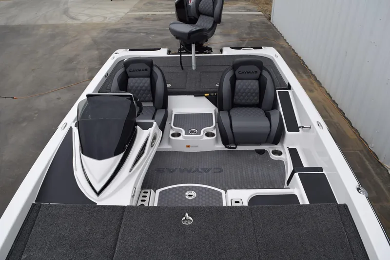 Slide: The Image of 2027 Cayams CX 20 PRo boat interior with sleek seating and modern design. - 12