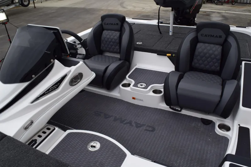 Slide: The Image of 2027 Cayams CX 20 Pro boat interior with dual seats and steering console. - 13