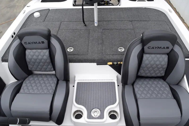 Slide: The Image of Luxury seating on 2027 Caymas CX 20 Pro boat, featuring quilted gray upholstery. - 14