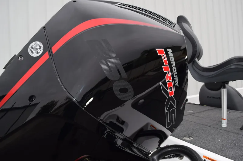 Slide: The Image of 2027 Cayams CX 20 Pro boat with Mercury Pro XS engine, featuring sleek black and red design. - 23