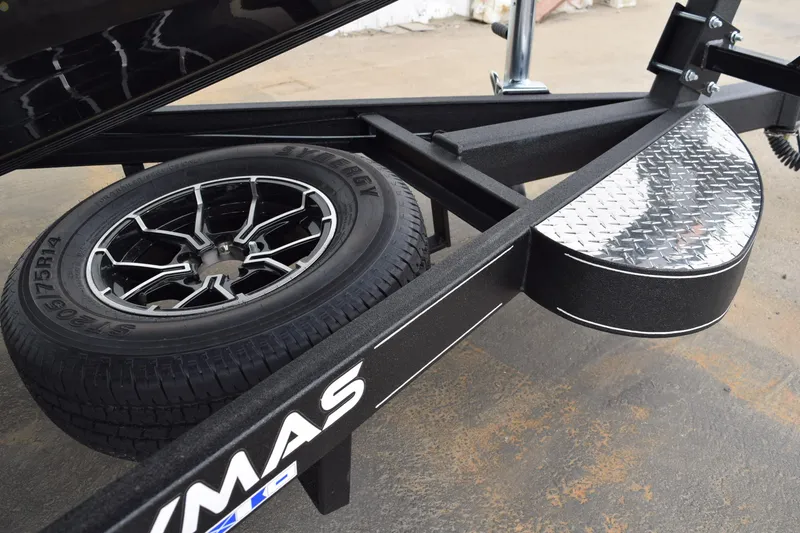 Slide: The Image of Trailer wheel and fender of 2027 Cayams CX 20 PRo, featuring sleek design and sturdy construction. - 27