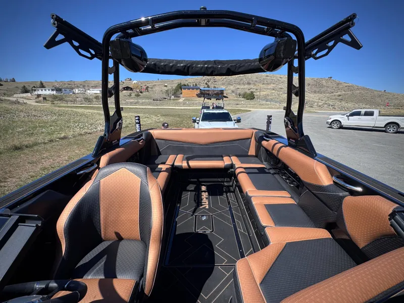 Slide: The Image of Interior of 2026 Supreme S240 boat with luxurious seating. - 14
