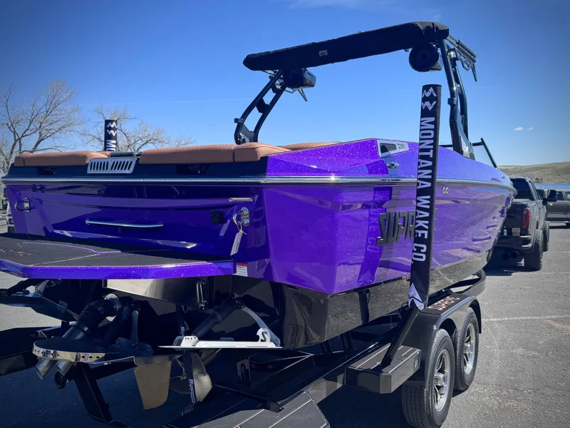 Slide: The Image of Purple 2026 Supreme S240 boat on trailer. - 7