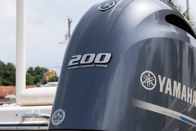 Slide: The Image of Yamaha 200 outboard engine on 2017 Grady-White Freedom 205 boat, featuring variable camshaft timing. - 7