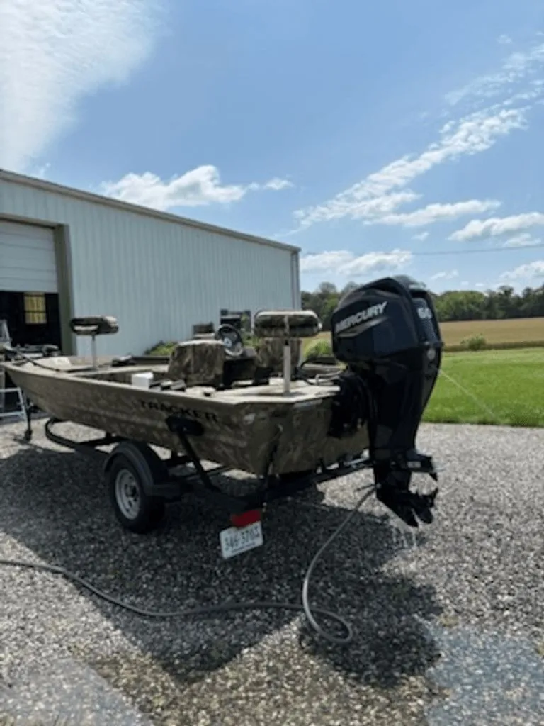 Slide: The Image of 2023 Tracker MVX 1754 boat with Mercury engine on trailer. - 3