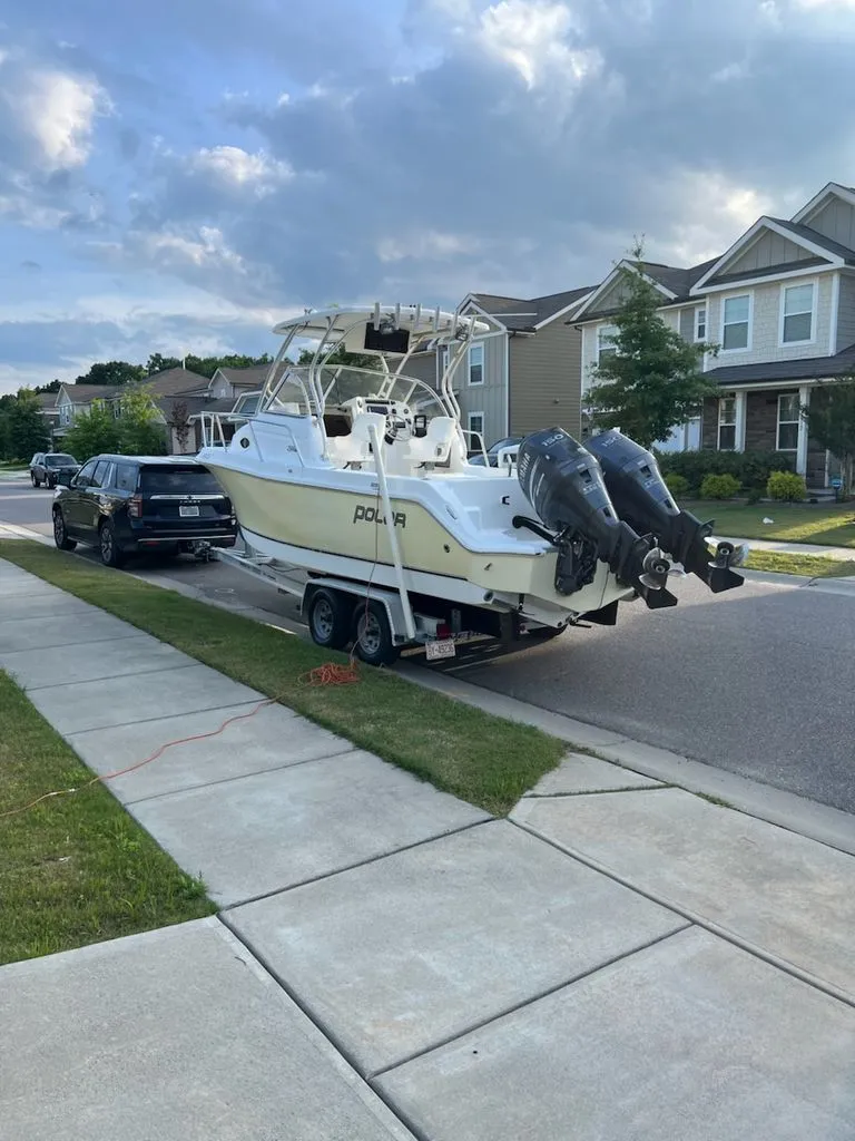 Slide: The Image of 2008 Polar 2300 WA boat on trailer in residential area. - 1