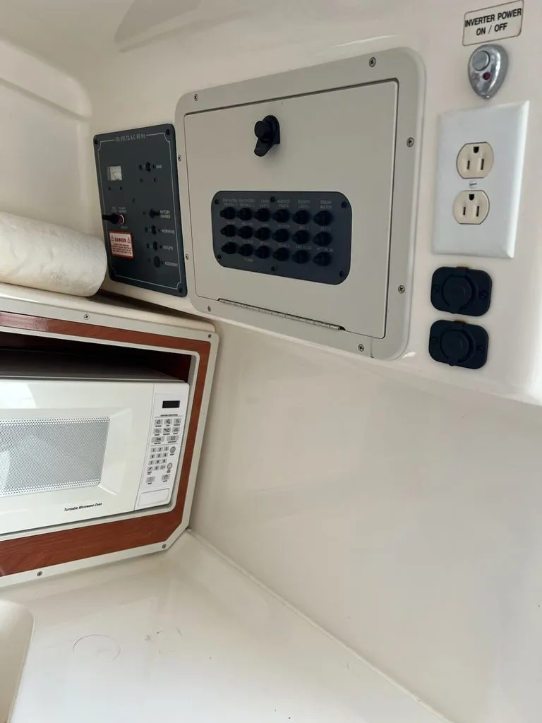Slide: The Image of Interior of 2008 Polar 2300 WA with microwave and control panel. - 14